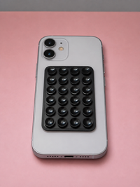 Support telephone a ventouse