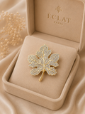 Broche feuille strass